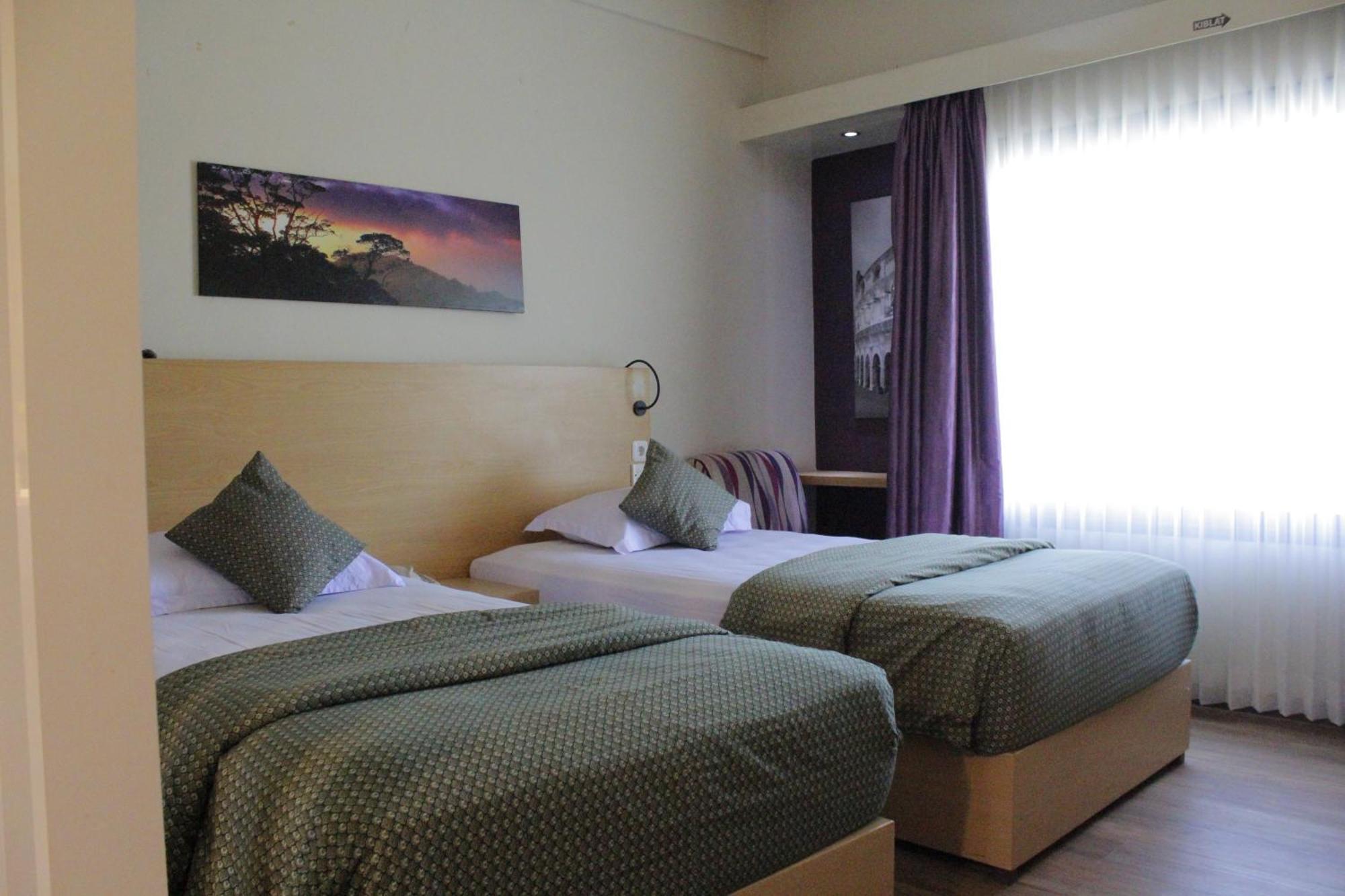 Lux Tychi Hotel Маланг Екстериор снимка